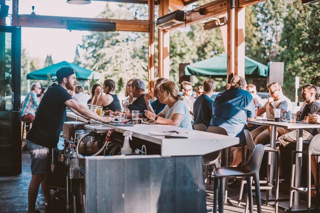 People sitting at outdoor bar