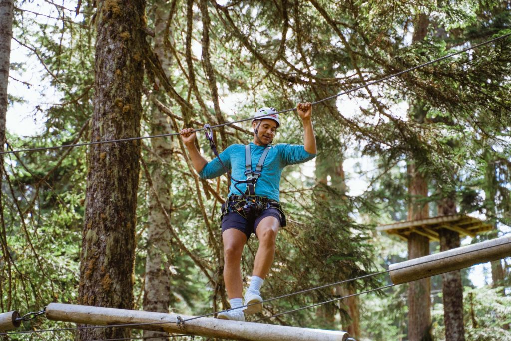 Man on treetops adventure on Grouse Mountain